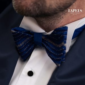 Blue self tied bow tie accessory for tuxedos